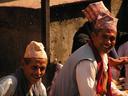 Nepali men in traditional headgear.