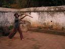 Maciej quickly joined a group of boys playing cricket in the temple courtyard.