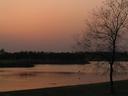 Sunset over the water in Lumbini.