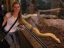Ashe with a giant Burmese Python in the San Diego Zoo.